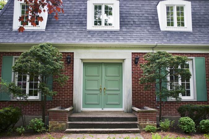 House with pale green front door