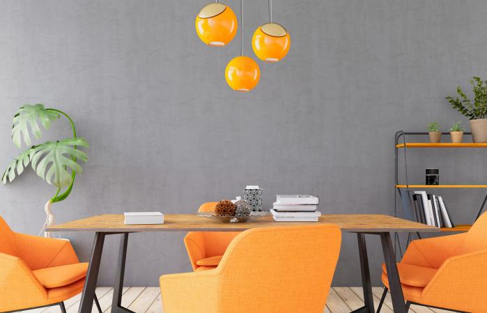Concerete Wall with Table and Orange Decors