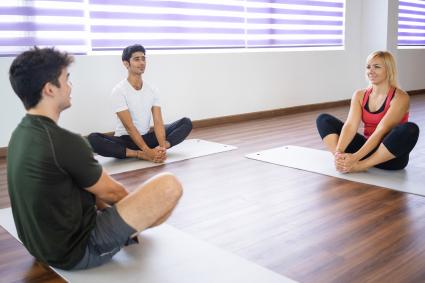 Three people doing hip exercise