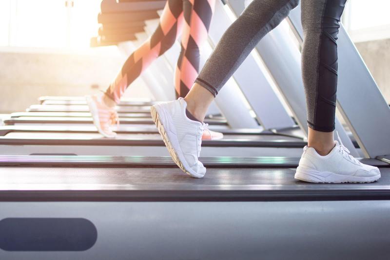 Exercise treadmill cardio running workout at fitness gym