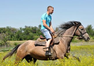 Man horseback riding