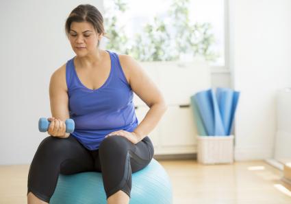 Woman exercising at home