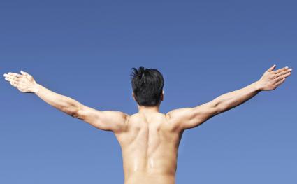 Bare chested Man Exercising