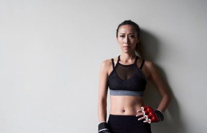 Portrait of confident female boxer