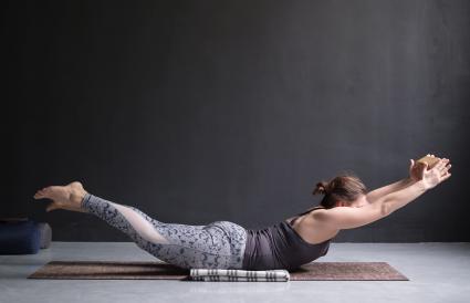 Woman doing superman pose