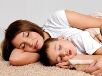 mother and child in yoga sleep