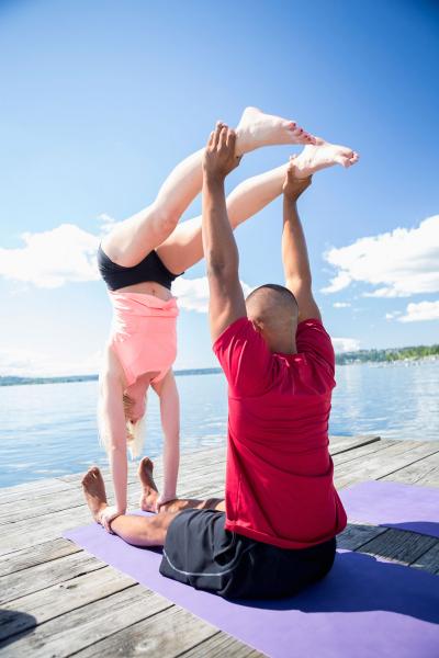 Couple in Jedi Box yoga pose