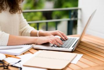 Novelist working on laptop