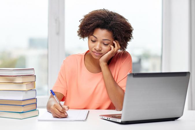 woman writing an essay