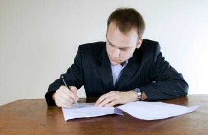 Man in the process of writing a poem