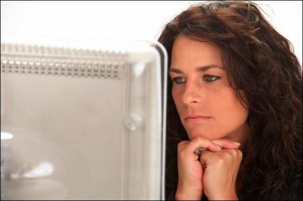 Woman reading erotica prompts online