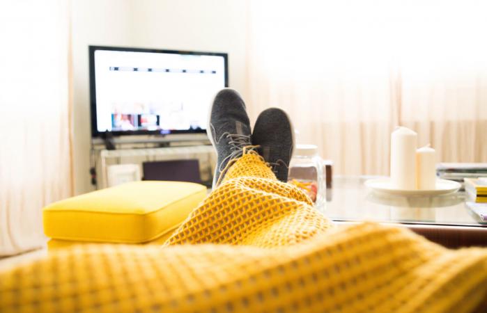 Guy watching tv