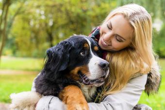 Woman embracing her dog
