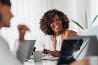 smiling woman on Thursday at office