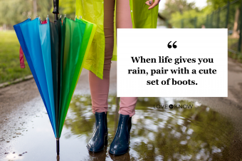 Beautiful girl in the rain with umbrella and water boots