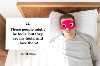 Man wearing funny sleep mask with goggly eyes