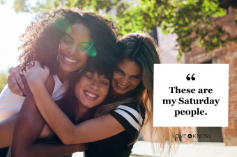 Group of female friends enjoying outdoors on city street