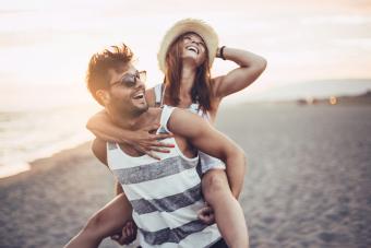Piggy back ride at the beach