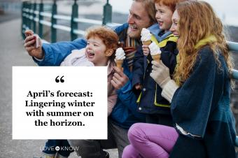 family with ice cream cones posing for picture on cold day