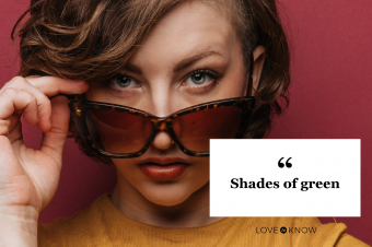 Young woman with green eyes wearing sunglasses