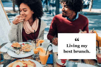 couple enjoying healthy lunch with friends in restaurant outdoor