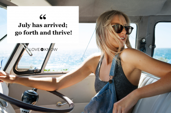 Girl driving friends in a surf van by the sea