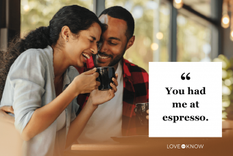 Couple talking over a cup of coffee at cafe