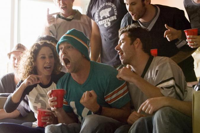 friends watching football