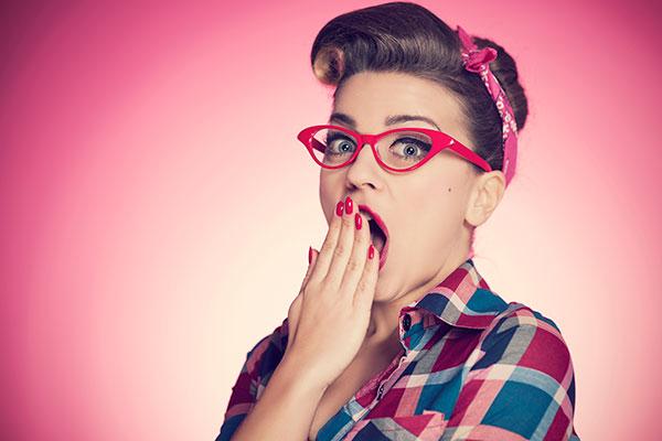 Shocked woman with glasses