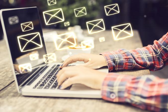 Email logo flying from key board