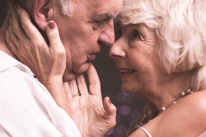 Senior couple looking into each others eyes
