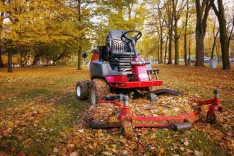 Lawn mower in autumn park