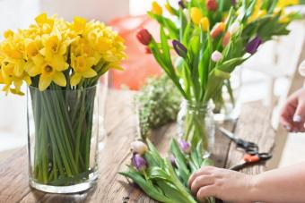 Tulips and daffodils on a wooden table