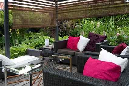 Outdoor garden room under pergola