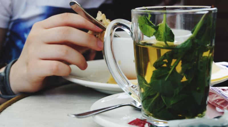 Glass mug of herbal tea
