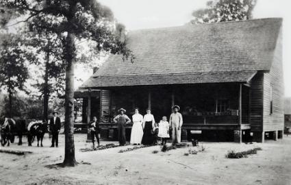 family on early homestead