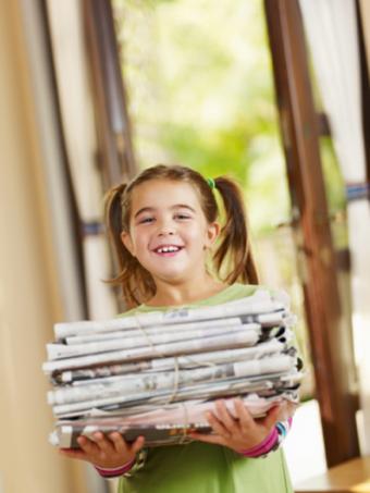 https://cf.ltkcdn.net/greenliving/images/slide/88417-375x500-kr_child_with_newspaper_.jpg