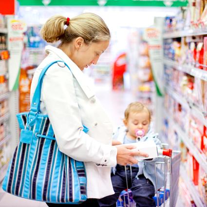 Mother reading food label