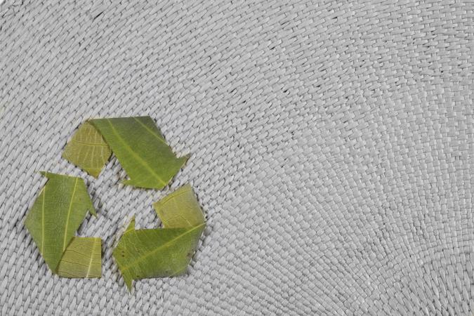 Plastic mat with recycle logo