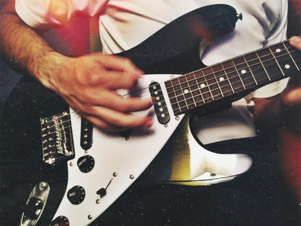 Man Playing Guitar