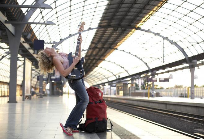 Woman playing guitar