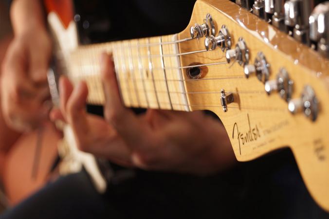 fender stratocaster guitar player