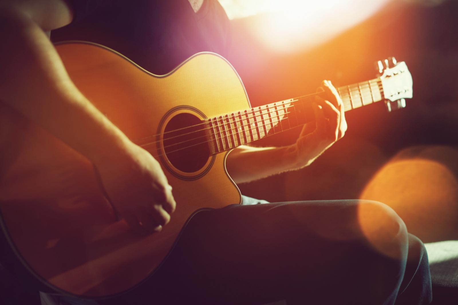 Practicing acoustic guitar
