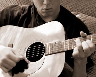 Playing guitar
