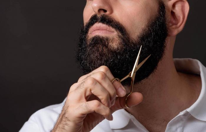 Man Trimming Beard