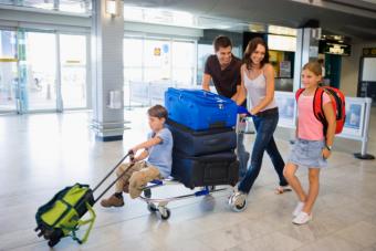 family with travel bags