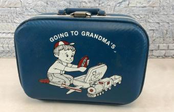 Going to grandmas store suitcase vintage