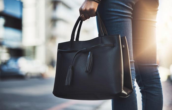 woman walking with her handbag