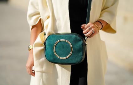 Sequoia bag with a golden circular insert