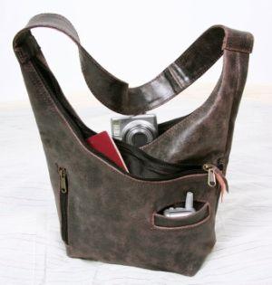 Image of a small, distressed gray messenger bag